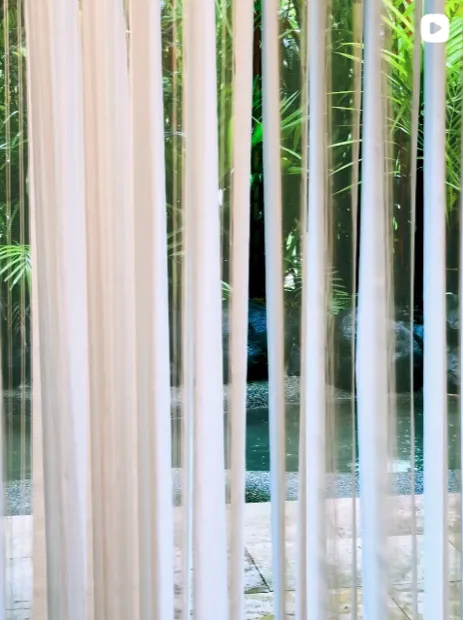 Nala Resort, the pool through the curtains, posted as a reel